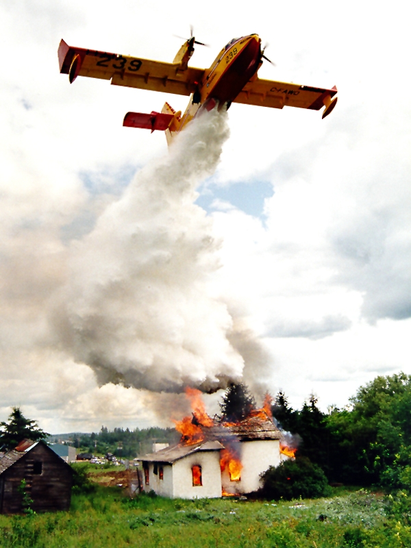 Viking Aerial Firefighter aircraft dropping water on a fire