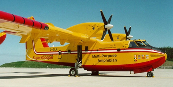 A yellow CL-415 aircraft on the runway
